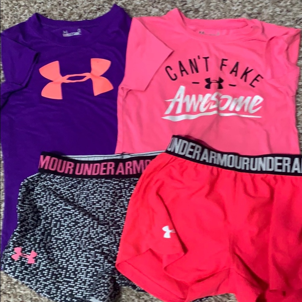 2  Under Armour shirts and 2 Under Armour shorts.